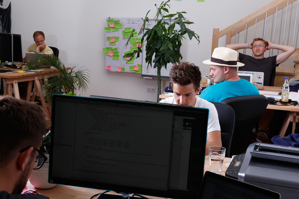 Florian (in the back) and the Codeship team at work